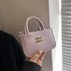 Bolso cuadrado pequeño y sencillo de mano, estilo coreano, bandolera con textura occidental, primavera 2025