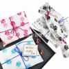 17g Papel de Sídney Patrón de Pata de Gato Lindo Papel de Regalo para Ropa Infantil Huella de Pata de Perro Negro Animal Papel Copia Venta al por Mayor