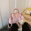 Atacado Transfronteiriço Bolsas Coreanas de Nicho Novidades 2026 Lindas Bolsas de Mão de Nicho Bolsas Transversais Simples em Formato de Concha Primavera e Verão