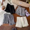 Calcetines de mujer estilo Miu, calentadores de piernas versátiles de estilo coreano con rayas verticales, cubiertas para piernas adelgazantes, nuevos calcetines holgados de lana tejida de otoño
