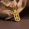 Mismo Estilo que en Xiaohongshu, un Colgante Vajra Giratorio, Apilable y Popular, Diseño Hueco con Diamantes, Estilo Étnico, Collar de Alta Gama