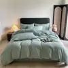 Nuevo juego de cuatro piezas de jacquard texturizado suave y amigable con la piel, juego de cama de tres piezas de color sólido para dormitorio de estudiante, disponible para venta al por mayor y dropshipping