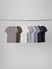 Camiseta Nuomi Básica de Lyocell com Gola Redonda e Manga Curta para Mulheres 2026 Verão Novo Estilo Caimento Simples e Top Refrescante