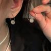 Pendientes fríos de estilo chino nuevo para mujer, pendientes de diseño de nicho para mujer, pendientes de alta gama color Hetian, Nueva Moda