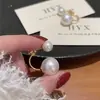 Coreia do Sul personalidade da moda frente e verso dois usos brincos de pérola branco pérola brincos de temperamento brincos de design único novos