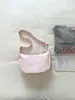 Bolso pequeño súper popular para mujer, nuevo bolso cruzado de nicho de lujo ligero de verano 2026, bolso tipo empanada versátil y de alta gama para el trabajo