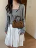 Bolsos de diseñador únicos para mujer 2026 nuevo bolso de moda de lunares estilo coreano elegante versátil para hombro y bandolera