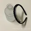 Diadema de tela de lunares simple envolvente para mujer, diseño de corona alta, diadema antideslizante con dientes para lavarse la cara, accesorio para el cabello elegante y con estilo
