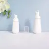 En stock botella cónica blanca de espuma de 60 ml, botella espumadora de PET para mousse de 100 ml, dispensador portátil de espuma facial