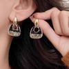 Pendientes de lazo negro de alta gama, sencillos, ligeros y de lujo, estilo frío, con temperamento femenino, pendientes retro Joker, venta al por mayor