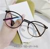 Gafas ultraligeras azul liso marrón claro montura redonda para hombre y mujer mismo estilo rojo de Internet montura de titanio moda montura al por mayor M6201