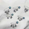Broche Colgante Ojo del Diablo Europeo y Americano Anillo del Año Astronauta Buena Suerte Ojos Azules Joyería Pin de Solapa para Hombres y Mujeres