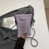 Bolsa de Celular Fashion com Recortes para Mulheres 2025 Nova Versátil Design de Nicho Bolsa Transversal Leve Casual para Compras Porta-Moedas