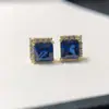 Una generación de pendientes de plata 925 incrustados con diamantes azules cuadrados de Princesa pendientes de oro medio anillo diamante roto incrustación de cuatro garras