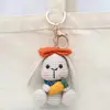 Colgante de orejas de conejo de lana tejida a mano, llavero de ganchillo, joyería, bolsa tejida de lana, colgante de muñeca