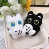 Novo Pingente de Bolsa de Casal Gato Preto de Pelúcia Olhos Grandes Segurando Peixe Boneca Super Fofa Chaveiro Pingente de Mochila Venda por Atacado