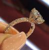 Deseo Nuevo anillo de princesa redondo con diamantes brillantes y creativos de gran venta, anillo de diamantes de propuesta de compromiso para mujeres de moda europea y americana.