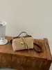 Bolsa de mão tipo travesseiro retrô de nicho coreana transfronteiriça para mulheres, nova bolsa de ombro e transversal elegante de alto valor para o dia a dia