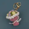 Dulce Colgante de Flor de Mano Tejido a Mano Exquisito Llavero de Lana Crochet Hecho a Mano Mini Colgante de Flor para Bolso