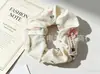 Goma para el pelo simple de perlas de alta elasticidad con lazo, scrunchie lindo, para manualidades, suministro al por mayor para puestos, directo del fabricante