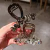 Pinza para el pelo de cristal colorida de alta gama y moda 2026 para mujer, elegante accesorio para el pelo de estilo coreano y japonés para la parte trasera de la cabeza, tocado de moda y versátil