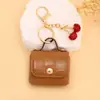 2026 Nuevos Estilos de Dijes para Bolsos con Decoraciones de Cerezas, Múltiples Colores Disponibles, Patrones Exquisitos, Accesorios de Estilo Lindo