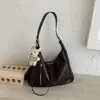 Bolso tote versátil y sencillo para mujer, nuevo modelo 2026, versátil bolso de axila de gran capacidad para el trabajo y los desplazamientos, bolso de hombro y cruzado