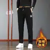 Pantalones de pana para hombre con forro polar, nuevos para otoño e invierno, venta al por mayor, bordados de China, pantalones casuales, versátiles, holgados, casuales