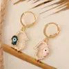 Europa y Estados Unidos moda transfronteriza ojo de diablo palma pendiente de gota de oreja modelado personalidad hermoso hip-hop temperamento aretes de clip para oreja venta al por mayor
