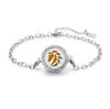 Pulsera de acero titanio con incrustaciones de diamantes calada tipo hilo de aromaterapia para difusión de aceites esenciales Pulsera con patrón de árbol de la vida europeo y americano venta al por mayor
