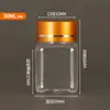 Atacado em Estoque Garrafas Plásticas Transparentes de 50ml 100ml com Tampas Douradas e Prateadas, Pequenas Garrafas para Remédios, Garrafas com Boca Larga para Dosagem, Garrafas com Boca Larga para Cápsulas