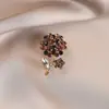 Novo broche estilo antigo de alta qualidade ins para mulheres estilo chinês leque borla pino de terno placket de pressão cheongsam corsage atacado