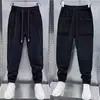 Outono de 2025 Novo Veludo Tendência Moda Estilo Coreano Calças Casuais Masculinas Largas Slim Calças de Moletom Calças Esportivas