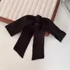 Acessório de Cabelo Elegante Coque Baixo Laço de Cetim Preto Presilha de Mola Novo Estilo 2025 Grampo de Rabo de Cavalo para Mulheres