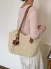 Bolso de paja con borla y pajarita, nuevo bolso tejido de paja, bolso de playa para vacaciones, bolso de hombro versátil, bolso tote de verano para el día a día