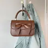 Bolso de mano de moda transfronterizo 2026, bolso cruzado de moda para mujer, bolso de hombro con lazo, bolso accesorio para monedero