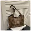Bolso de mano nuevo de comercio exterior con estampado de rombos, un bolso de mano simple y versátil que se puede llevar debajo del brazo, un bolso tote práctico y elegante para ir al trabajo, diseñado para mujeres