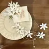 Pinza para el pelo de flor de lirio del valle, simulación de foto de viaje, para mujer, ambiente de bosque, súper de hadas, con borla, pinza lateral