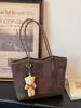 Bolsa Tote Grande de Gran Capacidad para Mujer Estilo Fresco 2026 Nueva Simple Cuadros Versátil para Viajar al Trabajo Hombro Axila Transversal