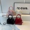 2024 Novas Bolsas Retro Feminina Portátil Transversal Simples Versátil Moda Coreana Nicho Mão Pequena Quadrada