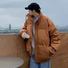 Chaqueta de plumón de pato blanco para pareja Hombres Invierno Marca de moda Holgada Versátil Cuello vertical Chaqueta de plumón Estilo Hong Kong Cálida Chaqueta con cremallera