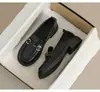 Mocasines de moda 2026 primavera y otoño nuevos estilo británico sin cordones zapatos JK zapatos de cuero negro de suela blanda