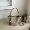 Bolso Shuai Mi Jia, color liso, elegante, nuevo modelo 2026, bolso de hombro casual, bolso de axila de moda, bolso cubo tejido para el día a día