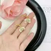 Estilo Coreano Super Hada Dulce Diamante Goteo de Aceite Lazo Amor Borla Pendientes Elegantes Lujo Ligero Sentido de Alta Gama Pendientes Delicados