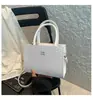Outono 2025 Design Casual Moda Casual Casual Padrão Tecido Retro Portátil Ombro Transversal Pequena Bolsa Quadrada Mulheres