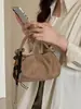 Elegante bolso de mano plisado 2026 nuevo popular retro simple bolsa de albóndiga nicho moderno bandolera hobo bag