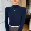 Otoño e Invierno 2025 Primera Línea Ropa Lista para Usar Suéter de Punto Delgado Corto de Cuello Alto para Mujer Suéter de Punto de Lana