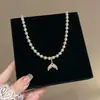 Collar de Cadena para Clavícula de Mujer con Perlas Redondas Espaciadoras, Ojo de Gato con Diamantes Completos, Cola de Pez, Estilo de Lujo Ligero, Diseño de Nicho, Temperamento