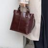 Bolso de mujer para ir al trabajo, bolso de mujer 2024, nuevo bolso bandolera de nicho, bolso tipo cubo, sencillo, combinable.