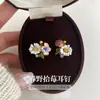 Brincos Assimétricos Flor de Jardim Agulha de Prata Pura S999 Brincos Dopamina Super Bonitos e Atraentes Novo Estilo Verão 2026